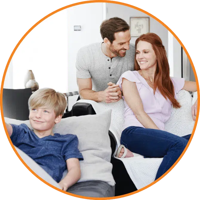 A family relaxes on the couch