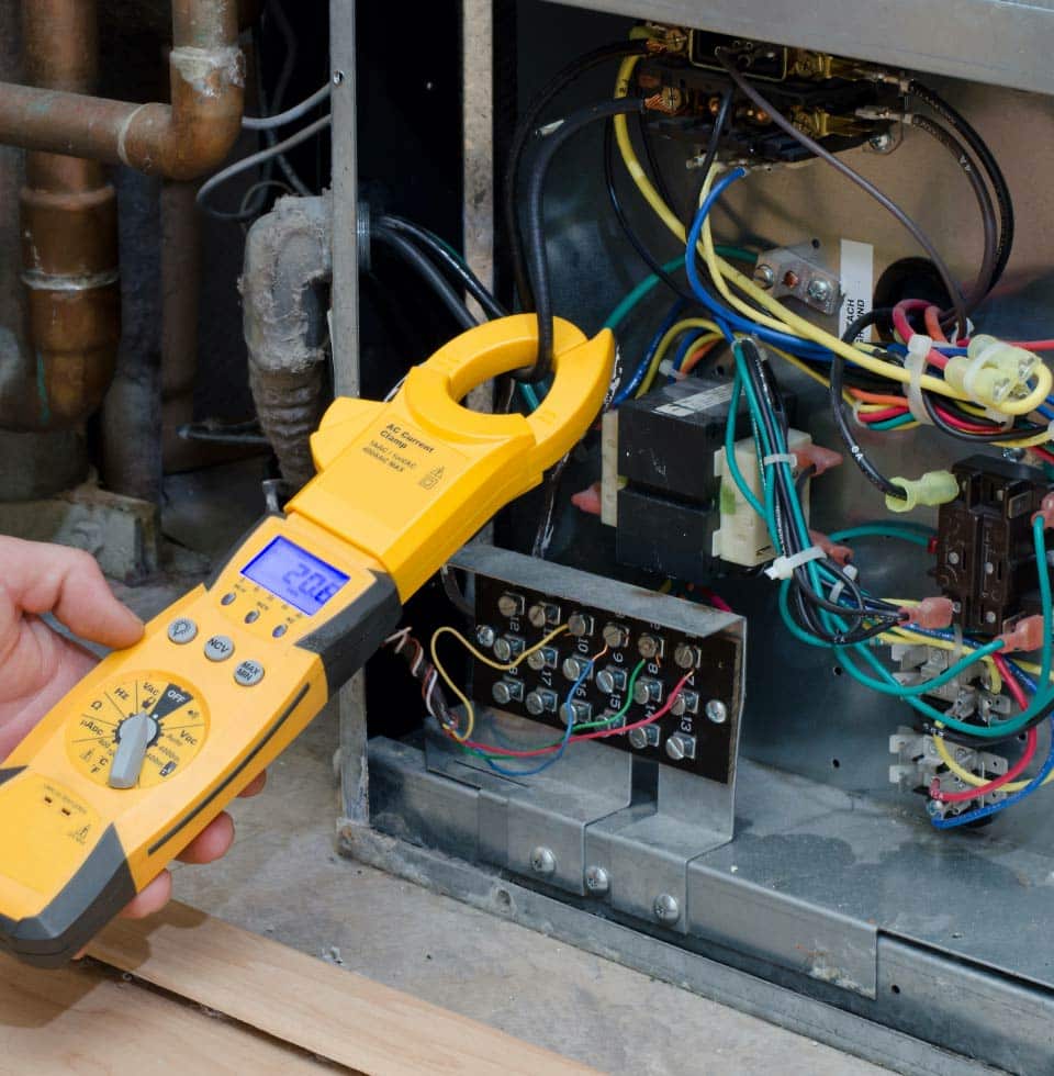 A closeup of a tool and a furnace.